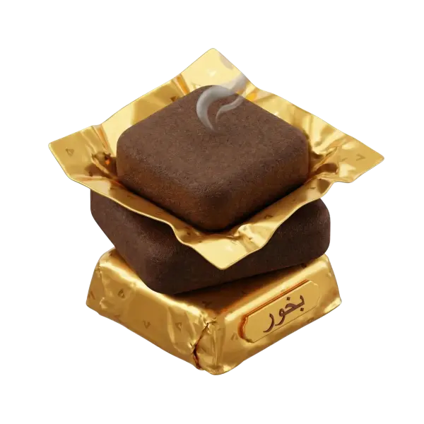 3D render of a stack of three square compressed brown bakhoor blocks with a textured matte surface, two wrapped in shiny gold foil and one partially unwrapped showing a thin curl of smoke. Isolated on a transparent background.