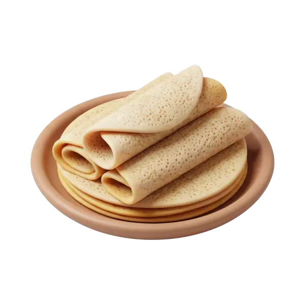 Close-up of stacked canjeero/laxoox flatbreads on a terracotta plate, showing pale beige color and porous, spongy texture with rolled edges against a black isolated background.