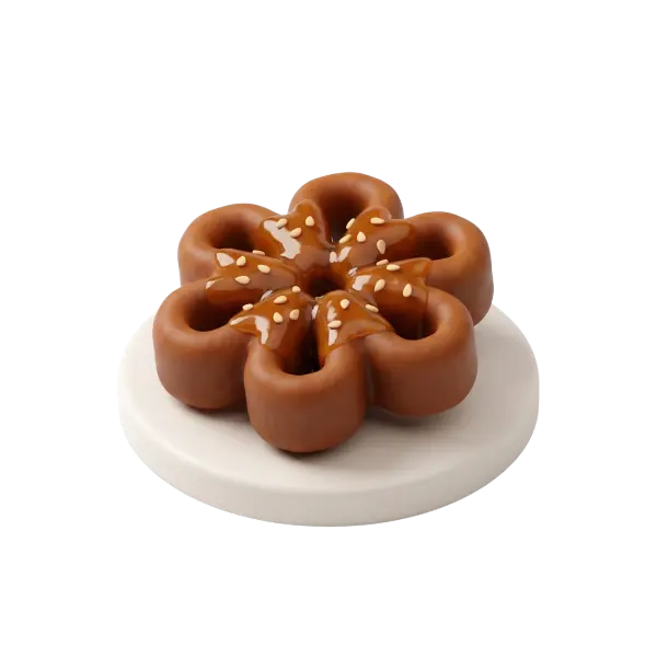Close-up of chebakia pastry glazed with sticky syrup and sprinkled with sesame seeds, arranged in a flower shape on a round white plate against a black background.