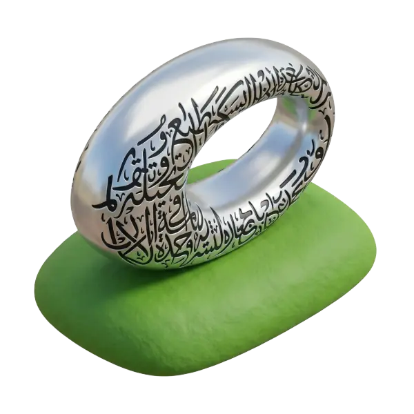 3D render of a shiny silver torus sculpture engraved with dense black Arabic calligraphy, placed on a soft green organic base; metallic glossy finish with carved decorative text and an isolated transparent background.