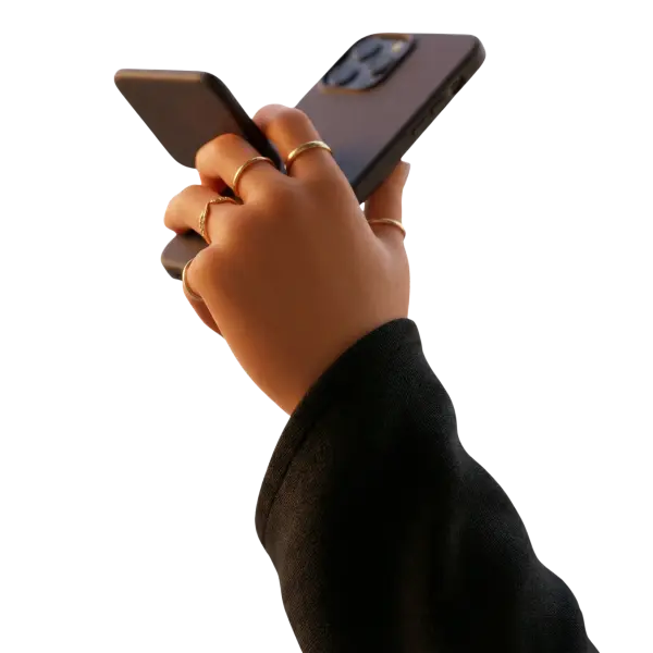 3D render of a hand holding a modern smartphone with a textured matte black case, several thin gold rings on the fingers, warm skin tones and a black/transparent background.