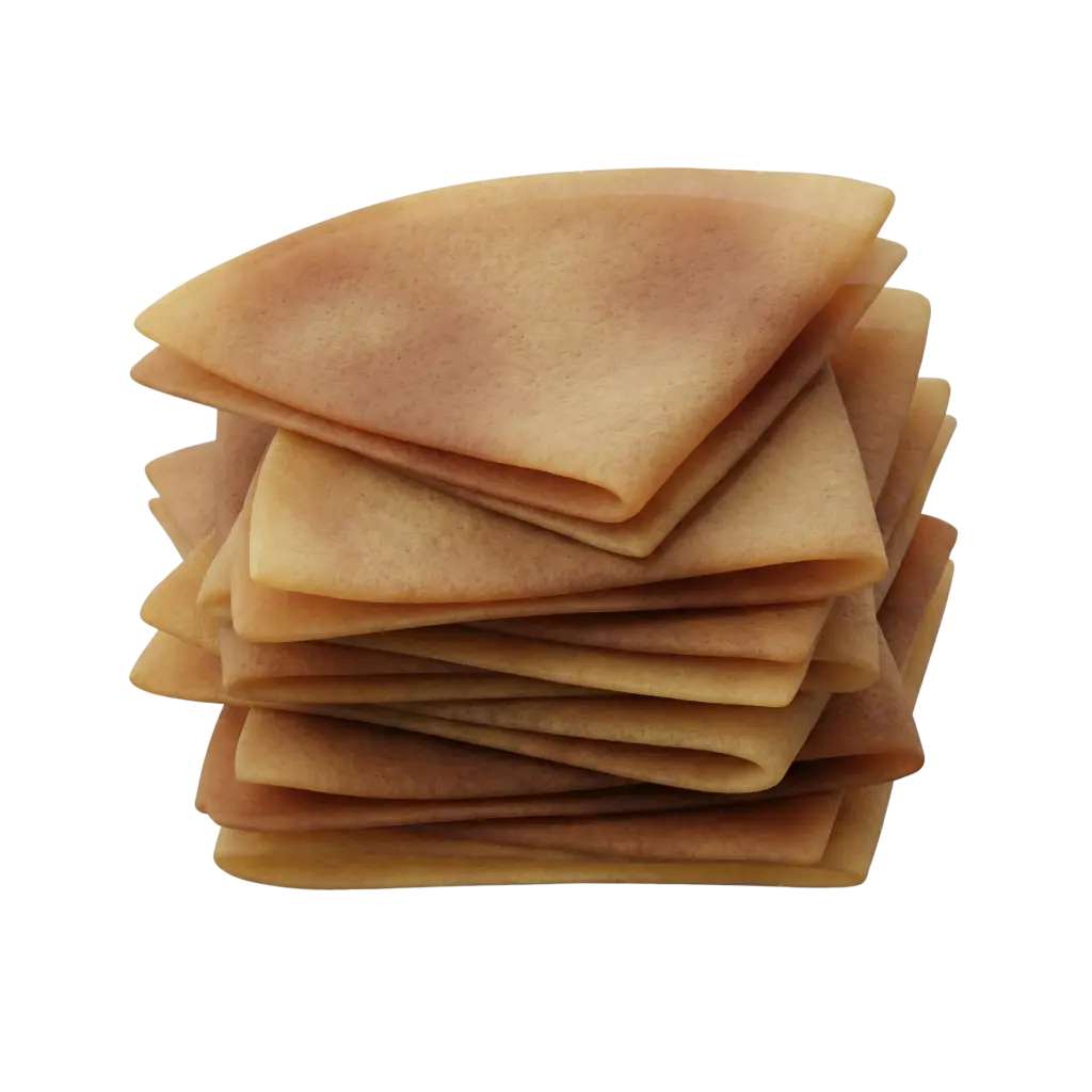 Close-up of a stack of thin folded kisra (sorghum flatbreads) showing layered triangular folds, light brown speckled surface and soft matte texture on a transparent background.