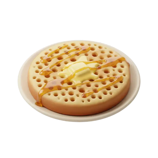 Close-up of a baghrir pancake with characteristic holes, topped with a melting pat of butter and drizzled honey, served on a white plate against a black background.