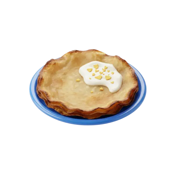 Top-down shot of a stack of thin regag flatbreads on a blue plate, with a glossy dollop of melted white cheese and small crunchy yellow crumbs on top against a black background.