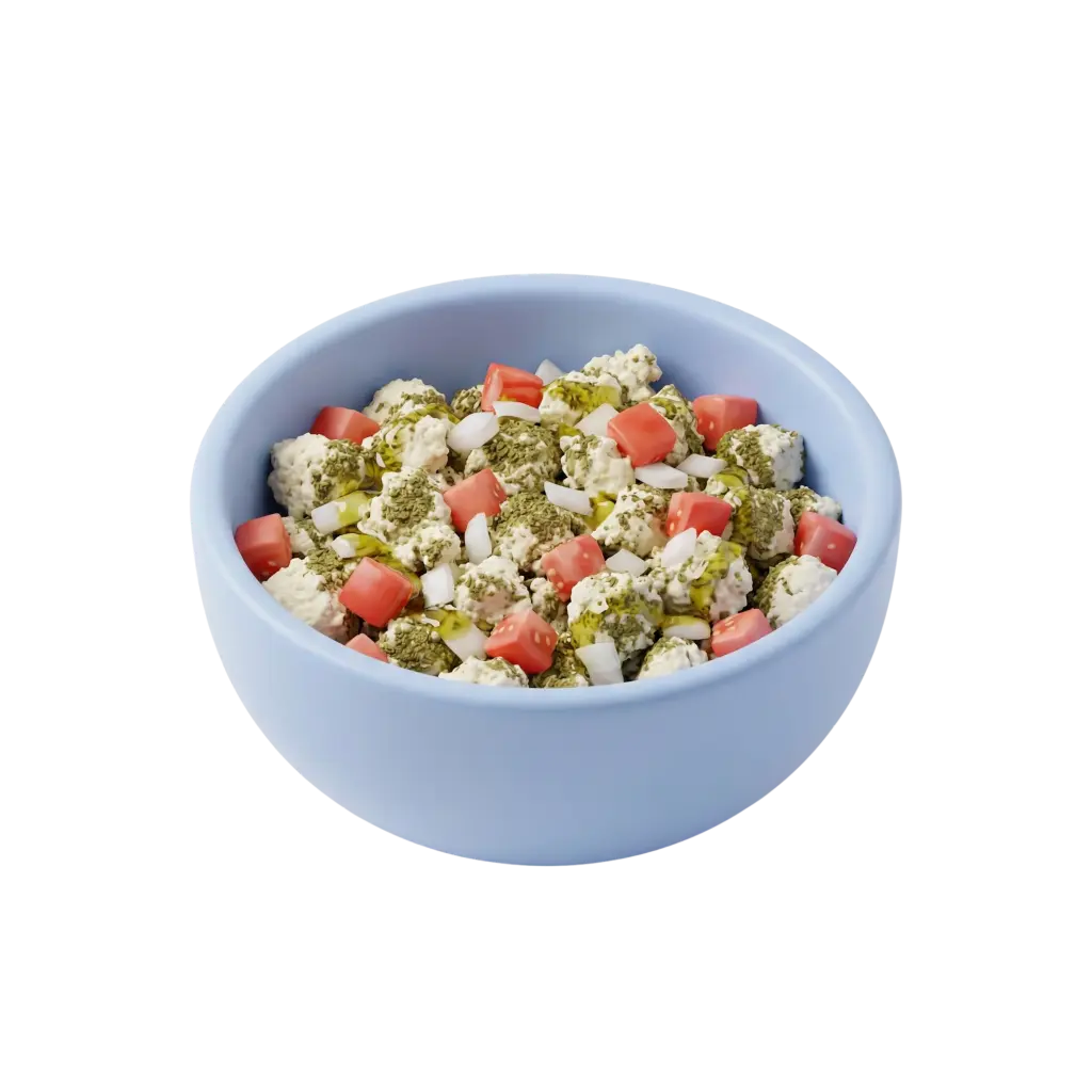 3D render of a light-blue ceramic bowl filled with small shanklish cheese balls coated in green za'atar, topped with diced red tomatoes, chopped white onion and drizzled olive oil, isolated on a black background.