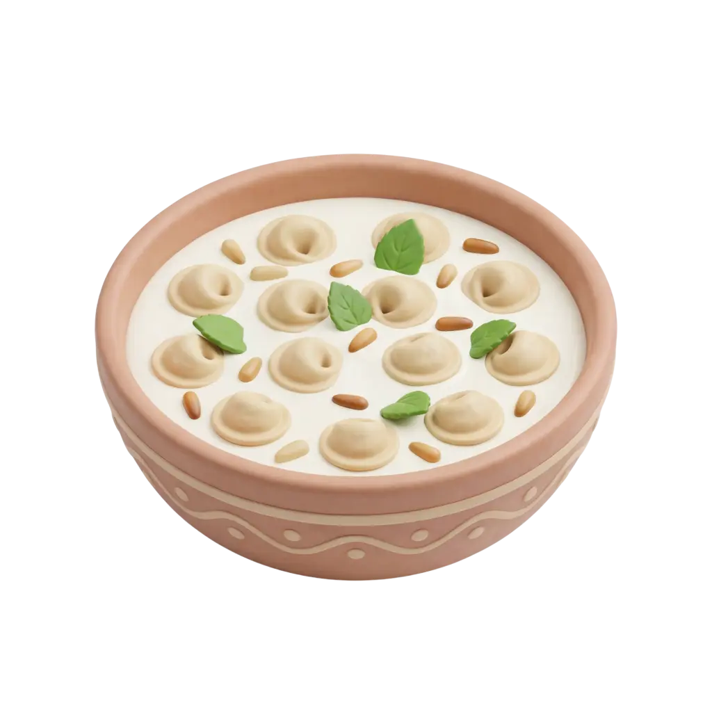 Top-down shot of a terracotta patterned bowl filled with shish barak: small meat dumplings in a creamy white yogurt sauce, garnished with pine nuts and green mint leaves, isolated on a black background.