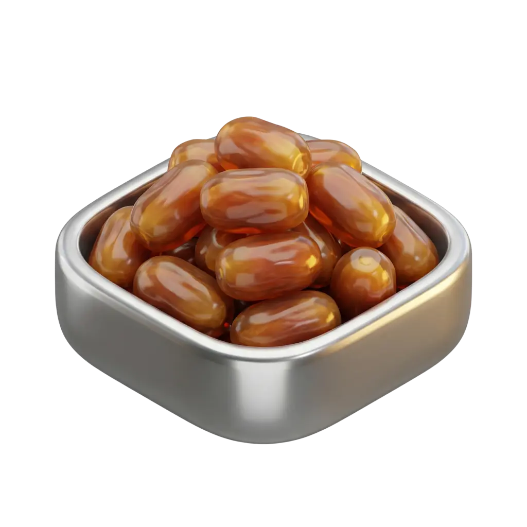 Close-up of glossy brown Sukkari dates piled in a square silver bowl with a reflective metal finish against a black background.